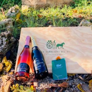 Imperial Rosé and Gran Reserve Brut Nature Cava with La Carretera del Vi passport and wine box